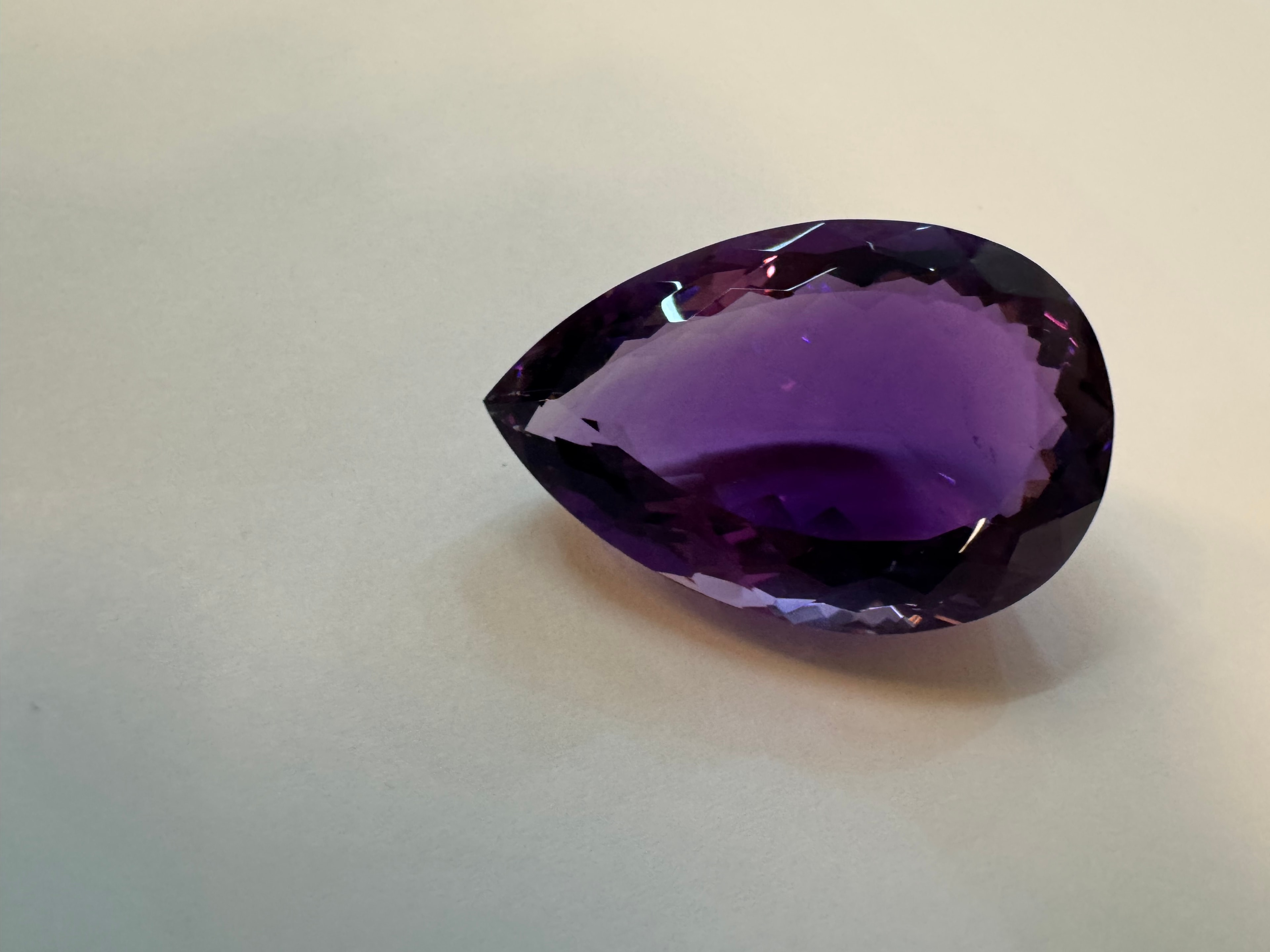 Brian Georges examining a Brazilian gemstone
